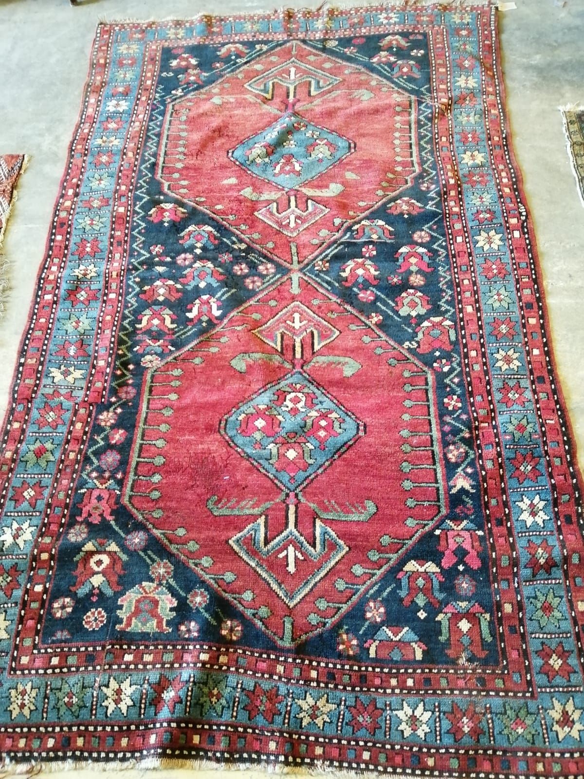 A Hamadan red ground rug, 230 x 140cm